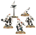 Three detailed robot figurines on stands with a white background